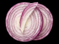 Red onion slices isolated on transparent background, ready for t-shirt design, clipart, stickers, print on demand, sublimation, and food-themed projects.