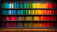 Colorful book spines arranged in rainbow spectrum order on wooden library shelves against dark wall, creating vibrant gradient display for education and learning concepts.