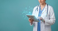 Female doctor in white coat using digital tablet with medical technology icons and network connections on turquoise background for healthcare innovation.