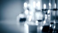 Abstract blurred office interior with soft bokeh lights creating professional atmospheric background for business presentations and corporate design.