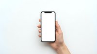 Hand holding modern smartphone with blank white screen mockup for app presentation and digital marketing campaigns.