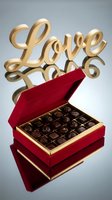 Luxury red velvet box of assorted chocolates with golden Love sign, perfect for Valentine's Day and romantic gifting concepts.