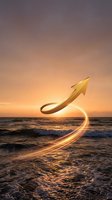 Golden upward arrow with glowing light trail over ocean sunset, symbolizing business growth, success, and financial progress for corporate and marketing use.