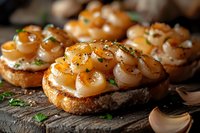 Grilled shrimp bruschetta with garlic and fresh herbs on toasted bread, served on rustic wooden board. Close up view with selective focus.