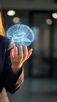 Businessman holding glowing holographic brain model representing artificial intelligence, innovation and mental health concepts in modern office environment.