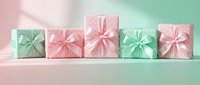 Row of pastel gift boxes with satin ribbons in pink and mint green colors arranged on gradient background for celebrations and special occasions.