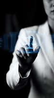Professional businessman touching futuristic holographic interface with digital icons and data visualization elements for modern technology presentations.