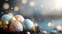 Festive Easter eggs decorated in pastel pink and blue with gold polka dots nestled in golden feathers against dark background with magical bokeh lights.