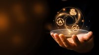 Glowing cryptocurrency coins floating above open palm against dark background with warm bokeh lights, representing digital wealth and financial technology investment opportunities.