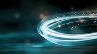 Glowing spiral light trail with sparkles on dark turquoise background creates dynamic motion effect, suitable for technology and innovation concepts.