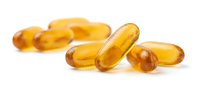 Amber-colored gel capsules containing omega-3 fish oil supplement scattered on white background for health and wellness marketing.