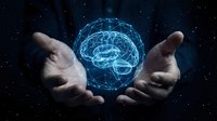 Human hands holding glowing digital brain with neural network connections against starry space background for technology and AI concepts.