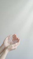 Open cupped hands in receiving gesture against neutral background expressing hope, prayer, support and giving concept for wellness campaigns.