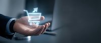Businessman holding glowing shopping cart with upward arrow icon, representing e-commerce growth, online sales increase, and digital retail success for business and marketing.