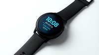 Smartwatch with black band displaying blue digital time and fitness metrics on round touchscreen display, isolated on white background for app design and wearable technology marketing.