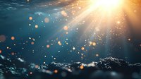 Magical sunbeams pierce through dark water surface with floating particles and bokeh lights creating mystical underwater atmosphere. Suitable for nature backgrounds.