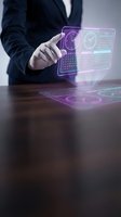 Businessman in dark suit and white gloves interacting with holographic digital interface displaying calendar, clock and calculator widgets for business technology and innovation concepts.
