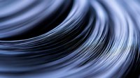Abstract blue and black motion blur waves creating dynamic flowing energy pattern for modern digital backgrounds and creative design projects.