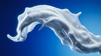 White milk splash creating dynamic curved wave motion against blue gradient background for dairy product advertising and beverage marketing campaigns.