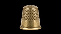 Gold metal thimble isolated on transparent background, ready for sewing, craft, and needlework designs. Great for stickers, clipart, t-shirt design, and print on demand.