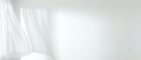 Soft white fabric folds and flowing textile material on neutral background, isolated for design use on apparel, web graphics, and marketing materials.