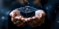 Glowing graduation cap floating above cupped hands against dark background with magical sparkles and bokeh lights, symbolizing academic achievement and success.