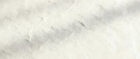 Footprints in white sand creating diagonal pattern across beach surface, suitable for travel, nature, and coastal design projects.