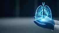 Digital holographic lungs floating above open palm showcasing respiratory health technology and medical innovation for healthcare presentations.