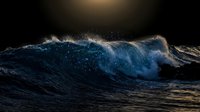 Powerful ocean wave with glowing bioluminescent spray crashing at night, dramatic seascape for marine, nature, and environmental design projects.