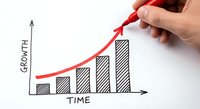 Hand drawing red arrow on business growth chart with ascending bars showing progress over time on white background for presentations and reports.