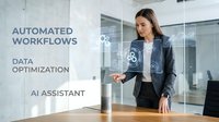 Professional businesswoman interacting with holographic AI interface displaying automated workflows and data optimization in modern office environment.