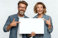 Happy mature couple pointing at blank white sign for advertising copy space on isolated background.