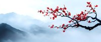 Red cherry blossom branch extends over misty blue mountain landscape, creating atmospheric Asian-inspired scenery with contrasting colors and peaceful zen mood.