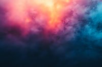 Dramatic colorful smoke clouds in pink, orange and blue tones creating ethereal atmospheric background with mystical dreamy effect. Suitable for creative design projects.