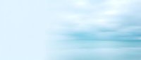 Soft blue and white clouds floating in peaceful sky creating dreamy atmosphere for meditation, wellness and relaxation backgrounds.