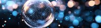 Transparent glass sphere with glowing particles against blurred blue bokeh background, creating magical cosmic atmosphere.