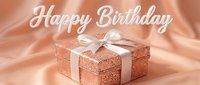 Happy Birthday greeting card with rose gold glitter gift box and satin ribbon on peach silk background, elegant celebration concept.