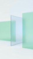 Translucent glass panel with mint green acrylic sheets creating soft shadows on white background, suitable for modern design, branding, and contemporary product mockups.