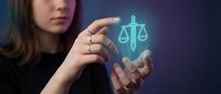 Professional woman holding glowing digital justice scales symbol representing legal technology, law firm services, and modern judicial system solutions.