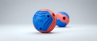 Blue and orange rubber dog toys with textured surfaces for interactive play and dental health on white background isolated for pet product design.