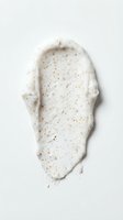 Creamy exfoliating scrub with fine particles spread on white background, suitable for skincare product packaging, cosmetics advertising, and beauty marketing materials.