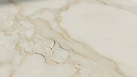 Cream marble surface with natural veining and subtle gold accents, suitable for luxury backgrounds, interior design projects, and high-end product photography.