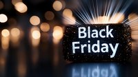 Glowing Black Friday text against dark background with golden bokeh lights and reflection, creating festive shopping atmosphere for seasonal promotions.
