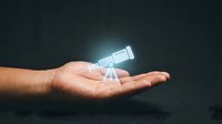 Male hand holding glowing telescope icon against dark background, representing astronomy, exploration, discovery, science education, technology innovation, and future vision concepts.