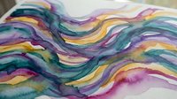 Colorful abstract watercolor painting with flowing wave layers in purple, teal, gold, and green tones on white paper.