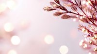Delicate pink floral branch with soft bokeh lights in background creates dreamy romantic atmosphere, suitable for wedding and spring season designs.