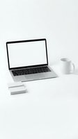 Modern laptop with blank white screen on clean white desk with coffee mug and business cards for mockup presentations and workspace design concepts.