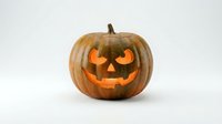 Carved Halloween pumpkin jack-o-lantern with glowing orange face isolated on white background for autumn holiday decorations and seasonal designs.