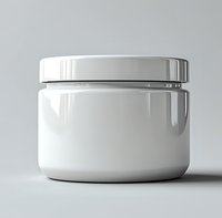 White cosmetic jar with metallic lid on light background, mockup for skincare product packaging design. Clean minimal style with realistic reflections.