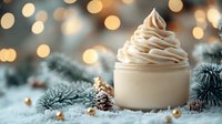 Creamy holiday dessert with swirled topping surrounded by festive pine branches, golden ornaments and warm bokeh lights creating cozy winter atmosphere.
